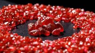 Striking ruby ring set in gold, glowing with fiery red tones — a bold gem fit for rebels and queens alike.