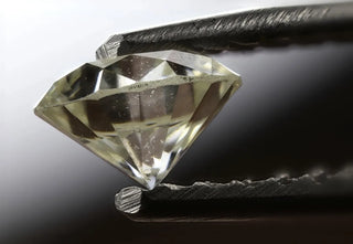 Diamond with laser inscription, enhancing security.