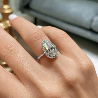 Pear-shaped diamond ring highlighting its unique teardrop shape and elegant sparkle.