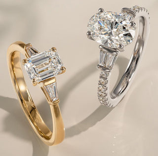 Close-up of metal swatches including yellow gold, rose gold, white gold, and platinum, arranged beside a partially crafted custom jewelry piece.