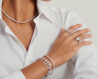 A romantic jewelry gift box with a diamond necklace and a handwritten anniversary note, capturing the emotion behind meaningful milestones.
