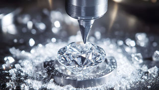 Close-up of a lab grown diamond being shaped by a precision cutting machine with diamond dust surrounding the stone in a high-tech production setting.