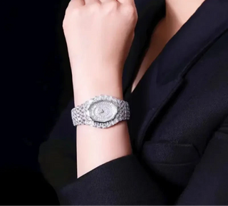 Diamond Hour Watch with 26 mm dial, silver case, sapphire crystal window, and diamond-accented bracelet clasp.