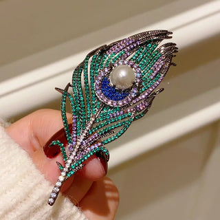 Noble Peacock Feather Brooch – copper-silver alloy with freshwater pearl and multicolored lab sapphires in green, blue, and purple.