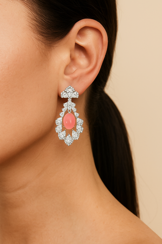 Pink Blossom Floral Earrings – Sterling silver floral earrings with soft pink coral, capturing the elegance of blooming petals.