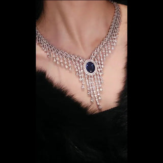 Royal Blue Necklace with luminous lab sapphire set in platinum-plated sterling silver, reflecting regal charm and refined elegance.

