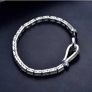 Sapphire Dusk Bracelet with white lab-created sapphires, crafted in sterling silver, capturing the essence of twilight elegance.