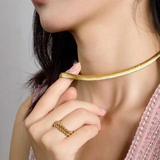 Serpentina Necklace in sterling silver with rose gold, 18K gold, and 24K gold finishes, designed for women. Elegant and timeless design