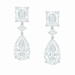 The Celestial Drops earrings: 18K white gold drop earrings with a 4 ct Asscher-cut, 0.5 ct round, and 10 ct pear-shaped lab-grown diamonds (29 ct total).