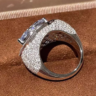Pharaoh’s Eye Ring by Azzallure featuring a vivid royal blue lab sapphire in a bold sterling silver setting with intricate detailing.

