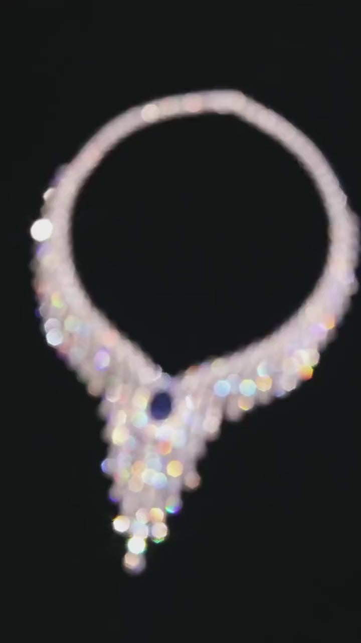 Royal Blue Necklace with luminous lab sapphire set in platinum-plated sterling silver, reflecting regal charm and refined elegance.

